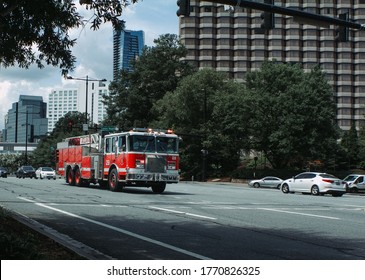 Fire Truck speeds through intersection en route to an emergency.