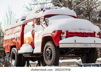 Fire Truck ZiL-130 In The Snow Installed As A Monument At The Fire Station: Obninsk, Russia - February 2021