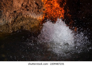 Fire And Water. Gas That Burns Directly From The Ground Passing Through The Water Table. Burning Natural Gas.