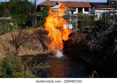 Fire And Water. Gas That Burns Directly From The Ground Passing Through The Water Table. Burning Natural Gas.