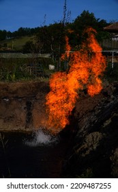 Fire And Water. Gas That Burns Directly From The Ground Passing Through The Water Table. Burning Natural Gas.