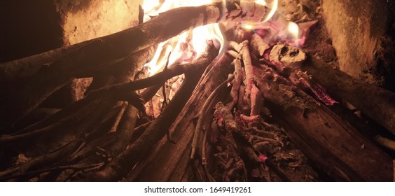 Fire wood brighly burning in furnace. Firewood burn in rural oven. Burning firewood in fireplace closeup. Fire and flames. Close up of burning fire wood in fireplace - Shutterstock ID 1649419261