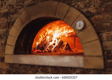 Fire Wood Burning In The Oven.