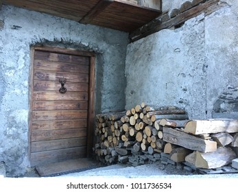 Fire Wood Cutting Logs Stacking For Freezing Cold Winter Snowfall Season Making Warm Fireplace In Ski Resort Farm House  Old Style Heating Chalet