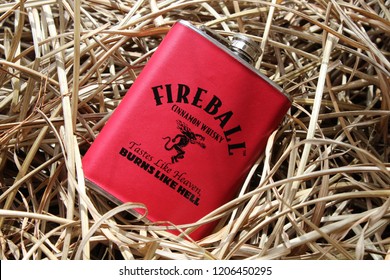 Fireball Flask Laying In Straw