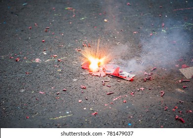 Firecracker exploding in the street for the chinese new year celebration