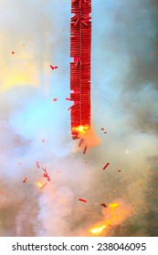 Firecracker On Fire With Smoke Blurred Background