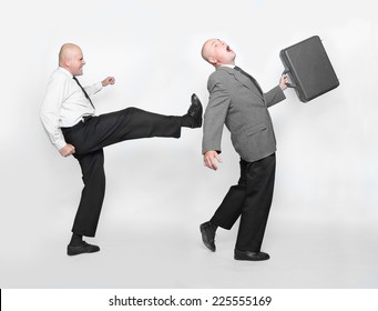 Fired Businessman And Angry Boss. Funny Picture From Office. 