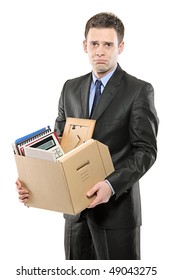 A Fired Man In A Suit Carrying A Box Of Personal Items Isolated On White