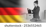 Fired woman from Germany. Girl who lost her job collects things in box. Germany flag. Unemployment in German republic. Fired woman needs unemployment benefits. Labor market crisis in Germany