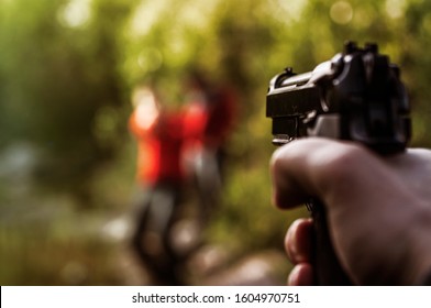 Firefight, Shooting, Crime Scene, Shooter With Black Beretta M9 Gun, Special Forces, Hostage Release. Special Storm Operation, Disarmament Of The Gangsters, Target. Bokeh Effect