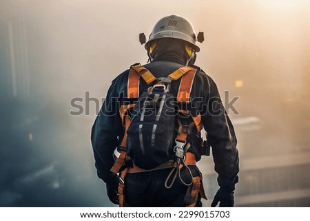 Firefighter in action at the scene of a fire. The concept of emergency rescue. 