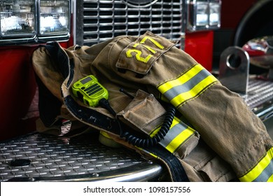    Firefighter coat on the fire truck                             - Shutterstock ID 1098157556