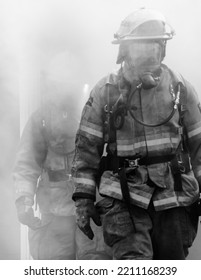 Firefighter Exiting A Burning Building