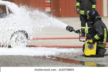 Firefighter Extinguishes A Fire That Broke Out In A Car With A Foaming Agent