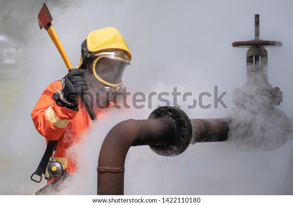 Firefighter Fireproof Orange suit Pipe cutting gas\
LPG Combustible Gas pipeline leaks at the joints with the valve\
Spark and Fire on the gas  explosion at the gas pipeline Fire\
protection alarm\
Safety