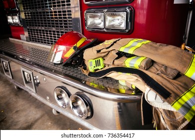 Firefighter gear on truck bumper