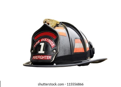 Firefighter Hat And Leather Badge Isolated Over A White Background