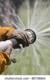 Firefighter With High Pressure Hose