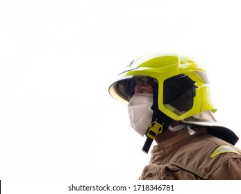 Firefighter With Mask And Helmet To Protect Himself From The Covid 19