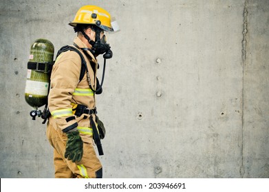 Firefighter Running With All Their Gear 