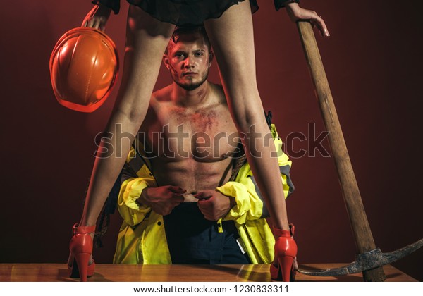 Muscle guy around sexy girls holding them Firefighter Sexy Body Muscle Man Holding Stock Photo Edit Now 1230833311