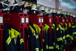 Firefighter Suits And Helmets At Fire Station