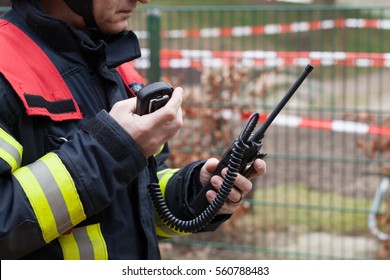 Firefighter used a walkie talkie in action - HDR - Powered by Shutterstock