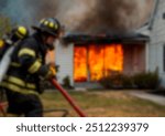 A firefighter using a hose to extinguish a fire in a building, surrounded by thick smoke, emphasizing the danger and urgency of firefighting