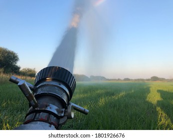 Firefighter Water Cannon On A Meadow