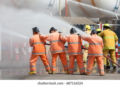 Firefighter Water Spray By High Pressure Fire Hose