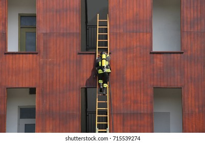 firefighter while climbing in the fire station building