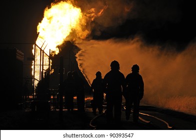 Firefighters In Action After A Gas Explosion