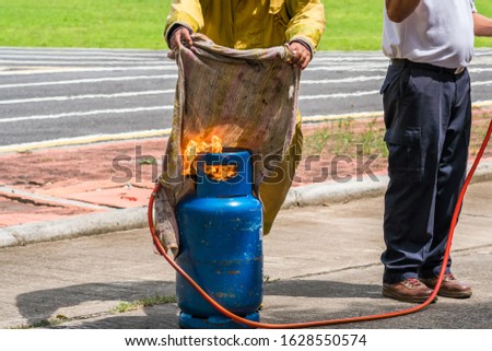 Firefighters are demonstrating fire fighting