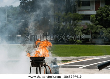 Firefighters are demonstrating fire fighting
