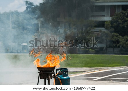 Firefighters are demonstrating fire fighting