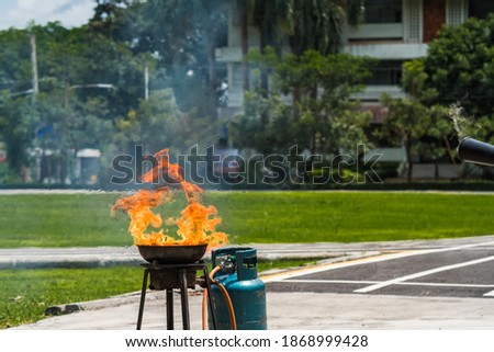 Firefighters are demonstrating fire fighting