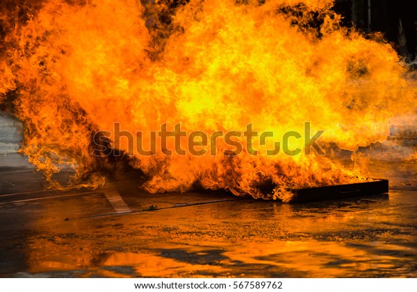 Firefighters extinguish a fire during a
training exercise.
