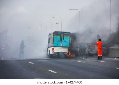 Firefighters Fire Small Truck With Truck Caps Car Explosive Car Crash And Catch Fire On Motorway