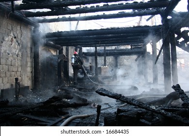 Firefighters Inside Burned Building Full Of Smoke