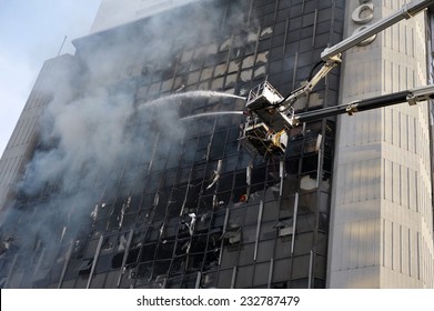 Firefighters Tackle a Blaze in a High Rise Building in Bangkok