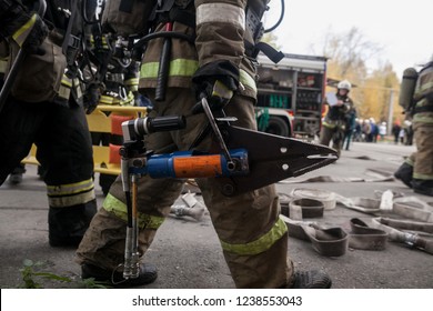 Firefighters Work On An Extrication Using A Hydraulic Rescue Tool