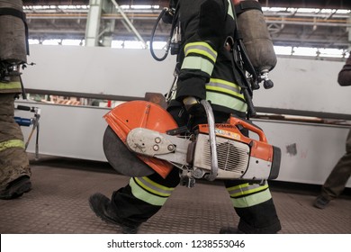 Firefighters Work On An Extrication Using A Hydraulic Rescue Tool