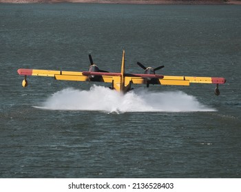 Firefighting Plane Picking Up The Water.