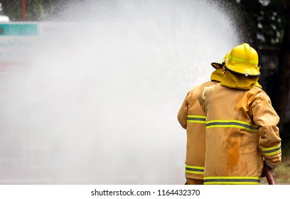 Fireman Attacking Fire Water Firefighter Team Stock Photo 1164432370 ...