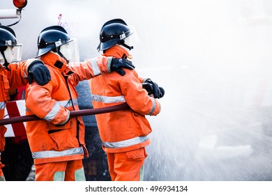 Fireman Attacking Fire Water Firefighter Team Stock Photo 496934134 ...