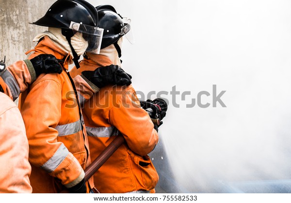 Fireman Attacking Fire Water Firefighter Team Stock Photo 755582533 ...