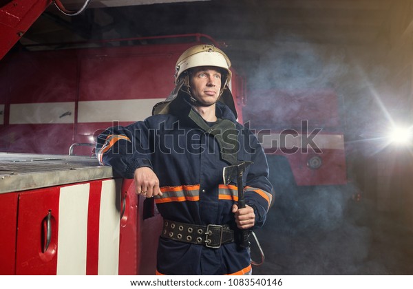 Fireman Firefighter Action Standing Near Firetruck Stock Photo Edit Now 1083540146