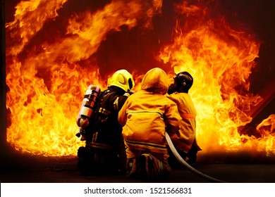 Fireman Wearing Fire Fighter Suit For Safety Under Danger Situation To Fighting With Flame In An Emergency Situation, Firefighter Training