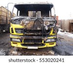 Firemen extinguish a auto; 